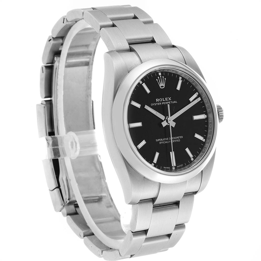 The Rolex Oyster Perpetual 114200 Men
s Stainless Steel Black Dial 114200 Men
s Stainless Steel Black Dial watch is shown at a slight angle, displaying its face, bezel, and part of its stainless steel bracelet.