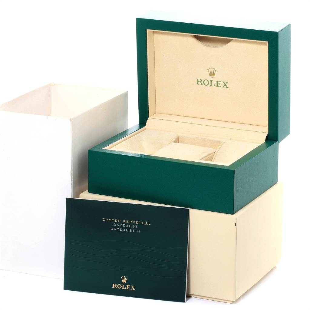 The image shows the packaging box, outer box, and manual for a Rolex Oyster Perpetual 114200 Men
s Stainless Steel Black Dial 114200 Men
s Stainless Steel Black Dial model.