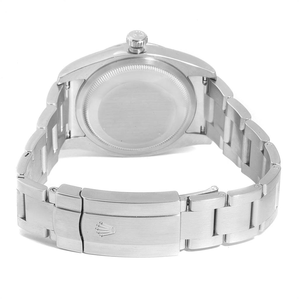 The image shows the back of a Rolex Oyster Perpetual 116034 Men's Stainless Steel Blue Dial 116034 Men's Stainless Steel Blue Dial watch, highlighting the clasp and bracelet.