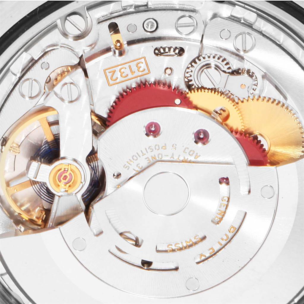 This image shows a close-up angle of the internal mechanical movement of the Rolex Oyster Perpetual 114300 Men
s Stainless Steel Silver Dial 114300 Men
s Stainless Steel Silver Dial watch.