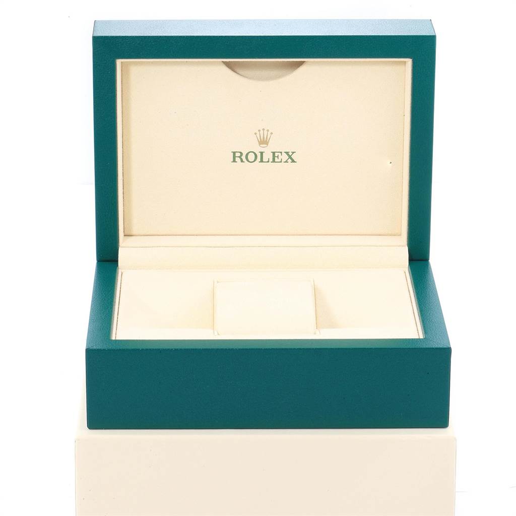 The image shows an open watch box for the Rolex Oyster Perpetual 114300 Men
s Stainless Steel Silver Dial 114300 Men
s Stainless Steel Silver Dial, viewed from the front.
