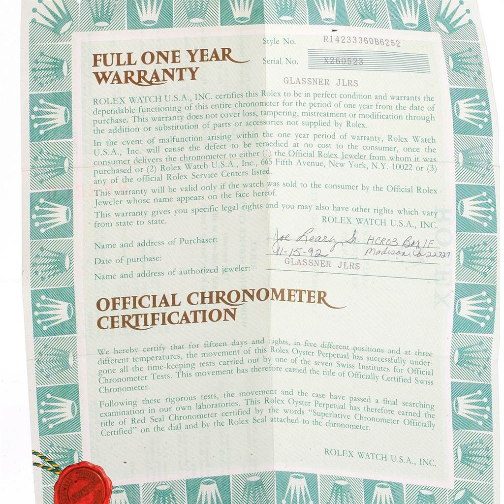 The image shows official warranty and chronometer certification documents for a Rolex Oyster Perpetual 14233 Men's Steel and Gold (two tone) Blue Dial 14233 Men's Steel and Gold (two tone) Blue Dial watch.