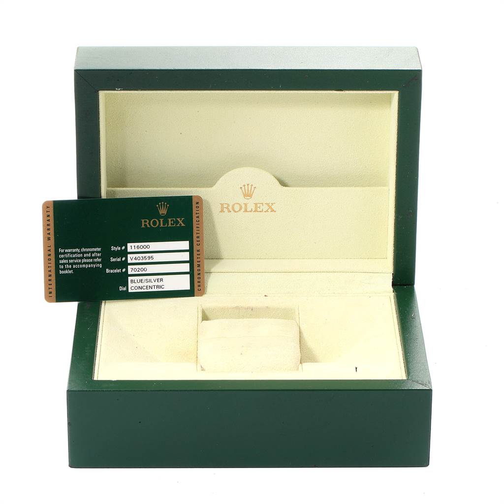 The image shows an open Rolex Oyster Perpetual 116000 Men's Stainless Steel Silver Dial 116000 Men's Stainless Steel Silver Dial box and a warranty card.