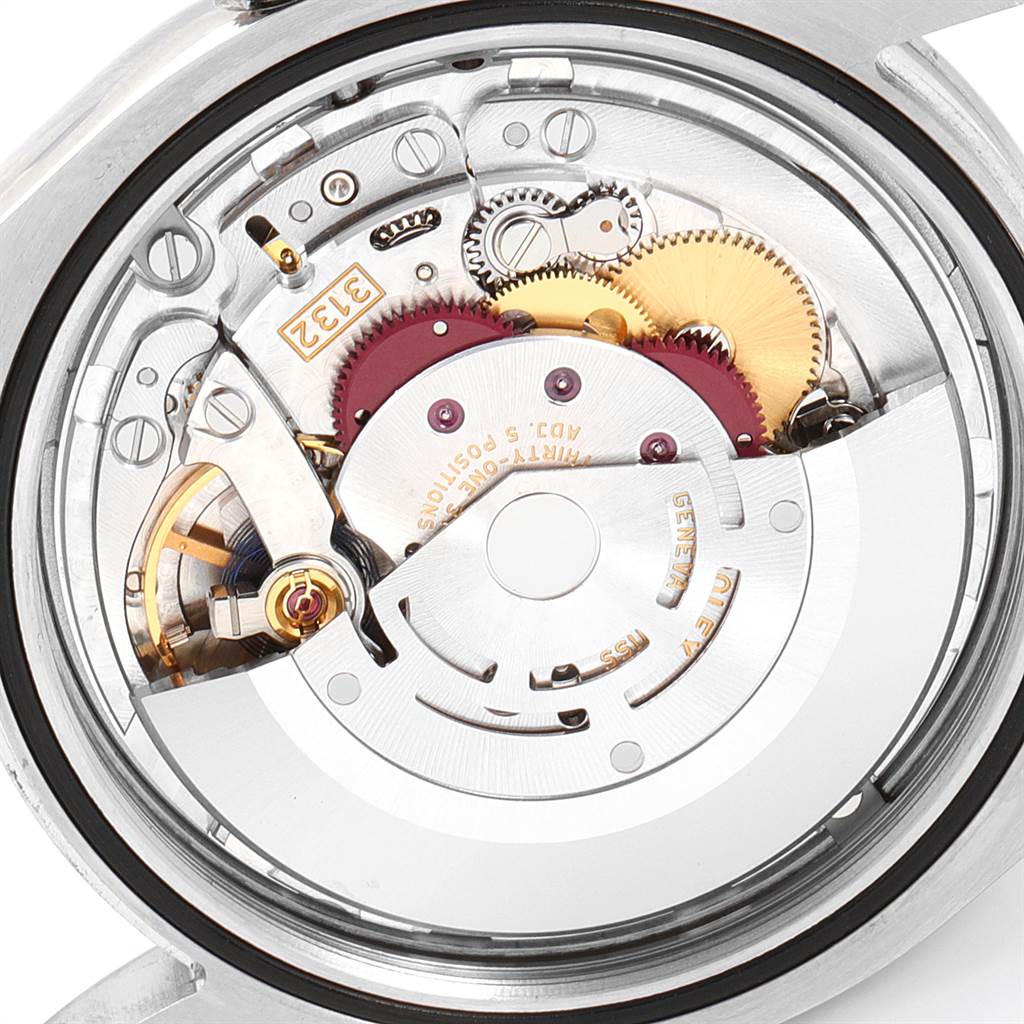 This image shows the movement and internal components of a Rolex Oyster Perpetual 114300 Men's Stainless Steel Blue Dial 114300 Men's Stainless Steel Blue Dial watch from a rear angle.