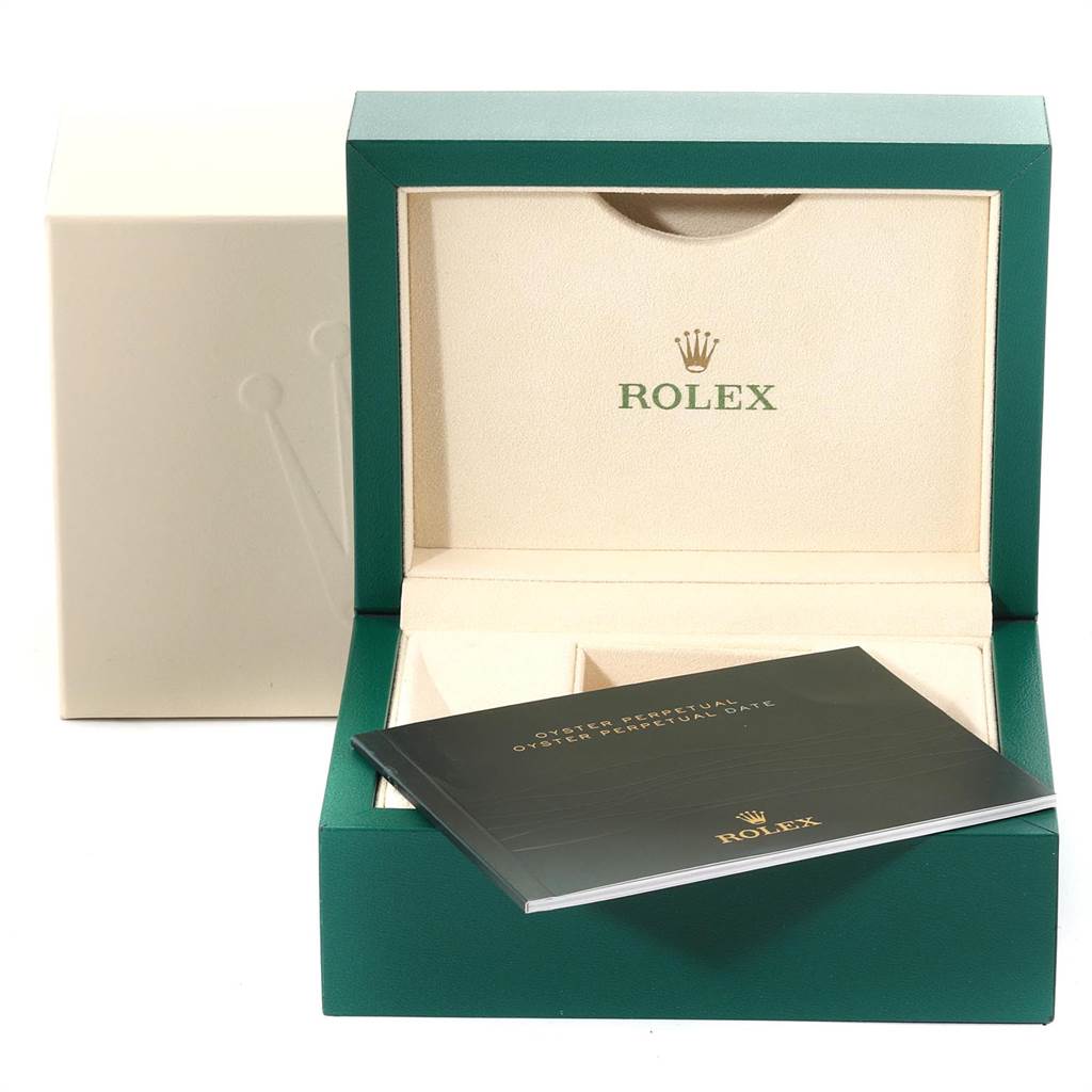 The image shows the Rolex Oyster Perpetual 114300 Men's Stainless Steel Burgundy Dial 114300 Men's Stainless Steel Burgundy Dial watch box and an accompanying booklet placed inside.