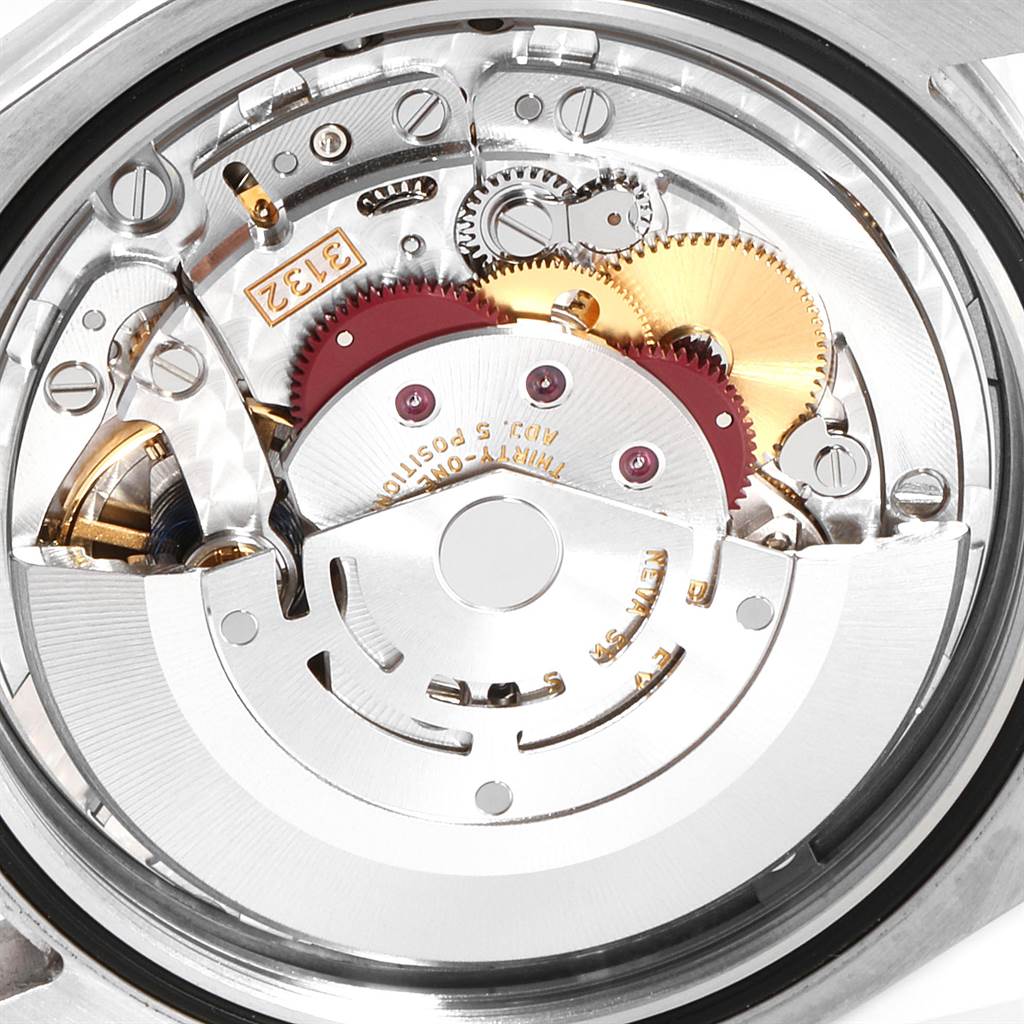 This image shows the internal mechanism and movement parts of a Rolex Oyster Perpetual 114300 Men's Stainless Steel Burgundy Dial 114300 Men's Stainless Steel Burgundy Dial watch from a top-down angle.