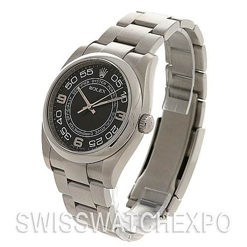 The Rolex Oyster Perpetual 116000 Men's Stainless Steel Black Dial 116000 Men's Stainless Steel Black Dial watch is shown at a three-quarter angle, displaying both the face and band.