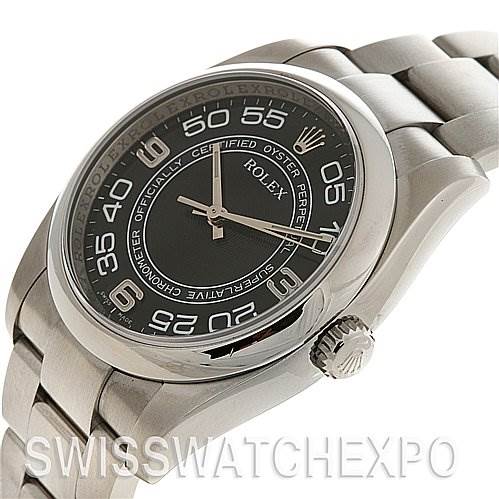The image shows a Rolex Oyster Perpetual 116000 Men's Stainless Steel Black Dial 116000 Men's Stainless Steel Black Dial watch at a three-quarter angle, highlighting the dial, bezel, bracelet, and crown.