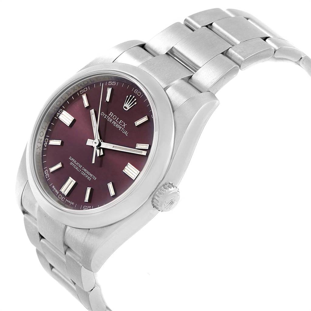 The image shows a Rolex Oyster Perpetual 116000 Men's Stainless Steel Burgundy Dial 116000 Men's Stainless Steel Burgundy Dial watch angled from the top-right, displaying the face, crown, and stainless steel bracelet.