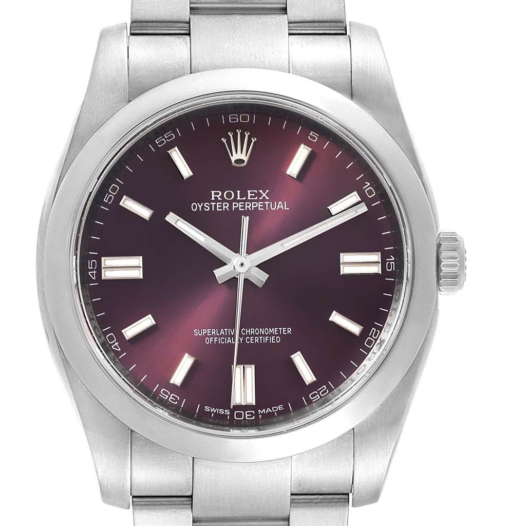 The image shows a frontal view of a Rolex Oyster Perpetual 116000 Men's Stainless Steel Burgundy Dial 116000 Men's Stainless Steel Burgundy Dial watch with a stainless steel case and bracelet, and a dark dial.