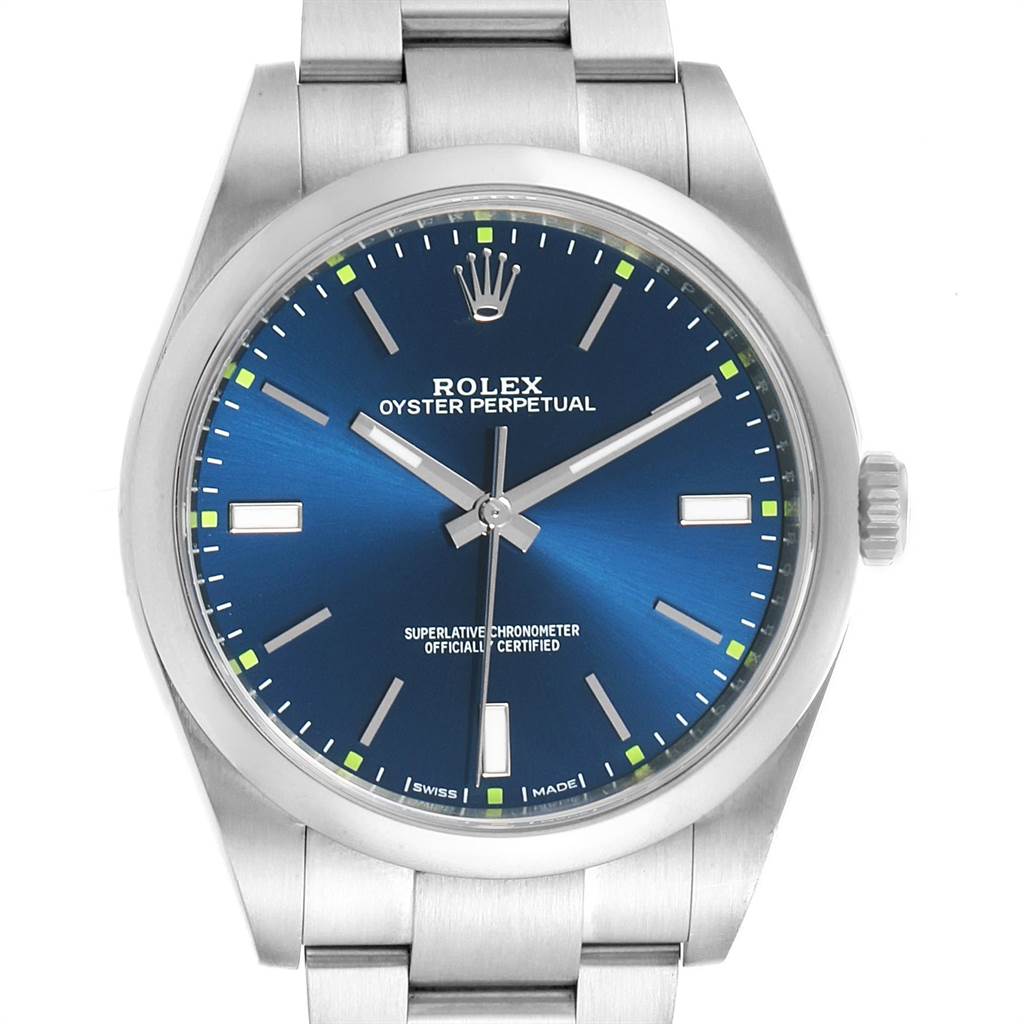 This Rolex Oyster Perpetual 114300 Men
s Stainless Steel Blue Dial 114300 Men
s Stainless Steel Blue Dial watch is shown from a front angle, displaying the dial, hands, and part of the bracelet.