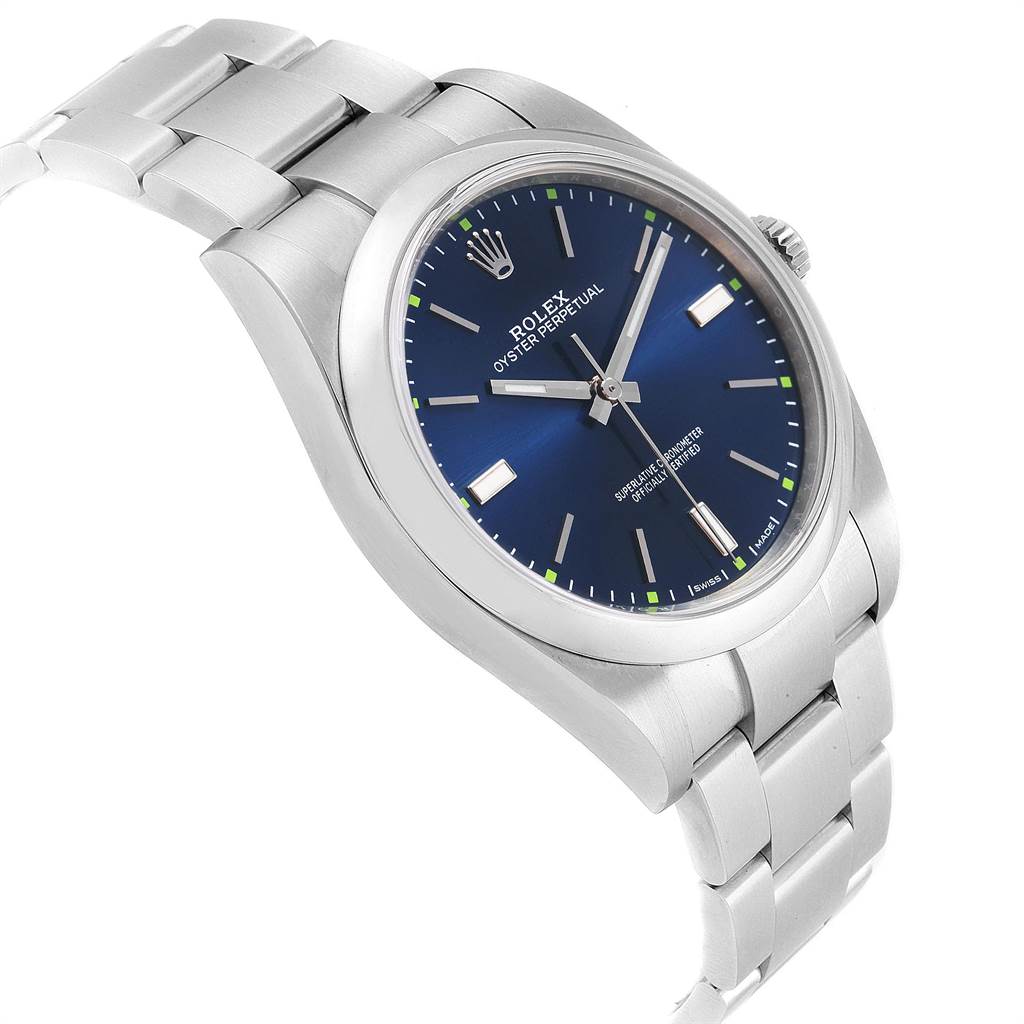 The Rolex Oyster Perpetual 114300 Men
s Stainless Steel Blue Dial 114300 Men
s Stainless Steel Blue Dial watch is shown at an angled side and top view, displaying its blue dial, silver bracelet, and bezel.