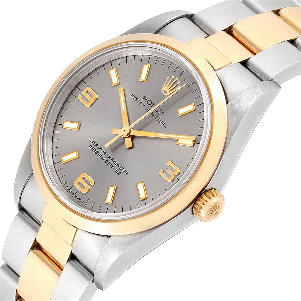 The image shows a close-up of the Rolex Oyster Perpetual 14203 Men's Steel and Gold (two tone) Grey Dial 14203 Men's Steel and Gold (two tone) Grey Dial watch face, crown, and part of the two-tone bracelet.