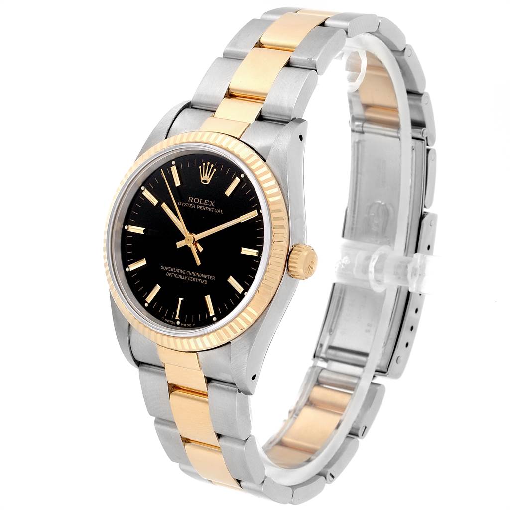 The image shows a Rolex Oyster Perpetual 14233 Men's Steel and Gold (two tone) Black Dial 14233 Men's Steel and Gold (two tone) Black Dial watch at a slight angle, highlighting its two-tone band, black dial, and fluted bezel.