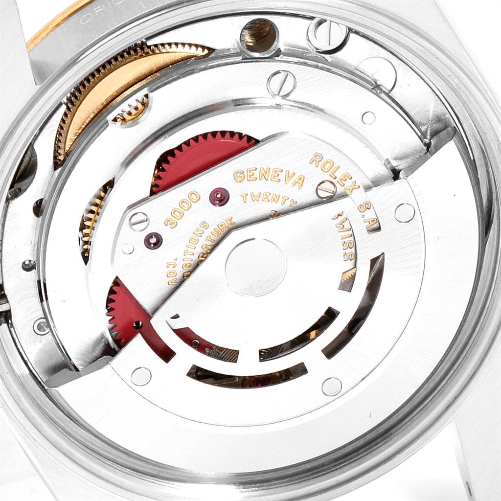 This image shows the movement mechanism of a Rolex Oyster Perpetual 14233 Men's Steel and Gold (two tone) Black Dial 14233 Men's Steel and Gold (two tone) Black Dial watch from the back angle.