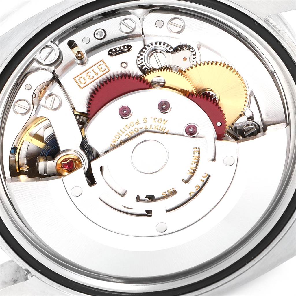 The image shows the inner mechanism and movement parts of a Rolex Oyster Perpetual 116000 Men's Stainless Steel Blue Dial 116000 Men's Stainless Steel Blue Dial watch, viewed from the back.