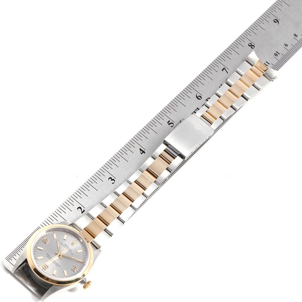 The image shows a Rolex Oyster Perpetual 14203 Men's Steel and Gold (two tone) Grey Dial 14203 Men's Steel and Gold (two tone) Grey Dial watch laid flat with its band measured by a ruler, displaying the face and full bracelet.