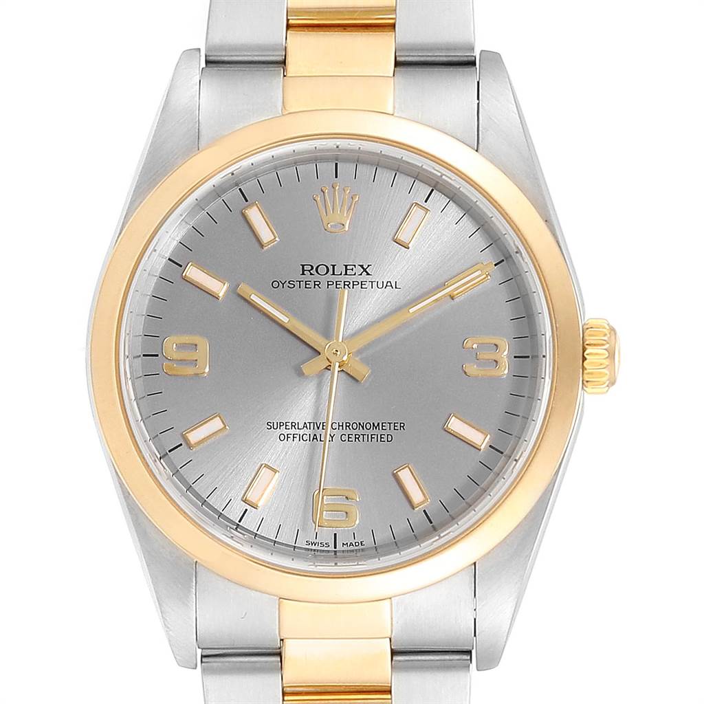 This image shows a face-on view of a Rolex Oyster Perpetual 14203 Men's Steel and Gold (two tone) Grey Dial 14203 Men's Steel and Gold (two tone) Grey Dial watch, highlighting the dial, bezel, and part of the bracelet.