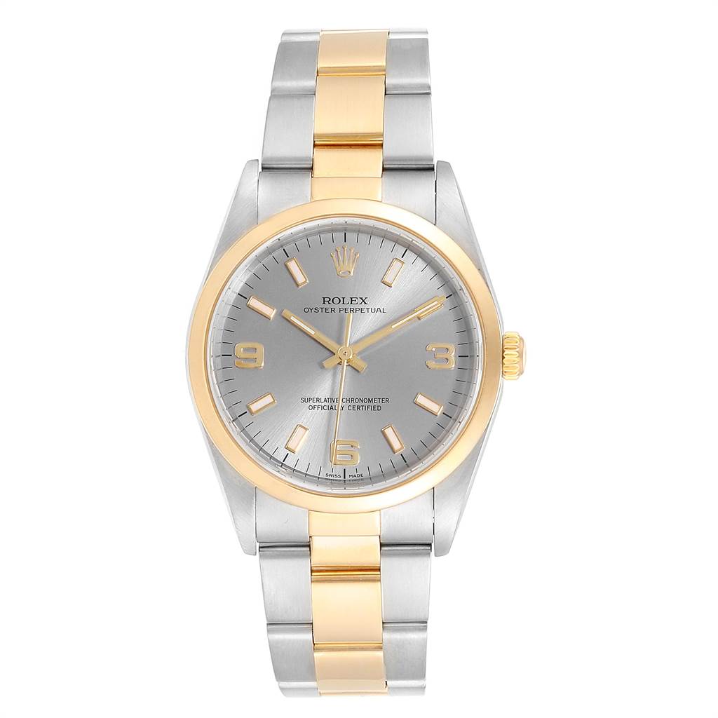 This is a front view of the Rolex Oyster Perpetual 14203 Men's Steel and Gold (two tone) Grey Dial 14203 Men's Steel and Gold (two tone) Grey Dial watch, showcasing its two-tone bracelet and silver dial.