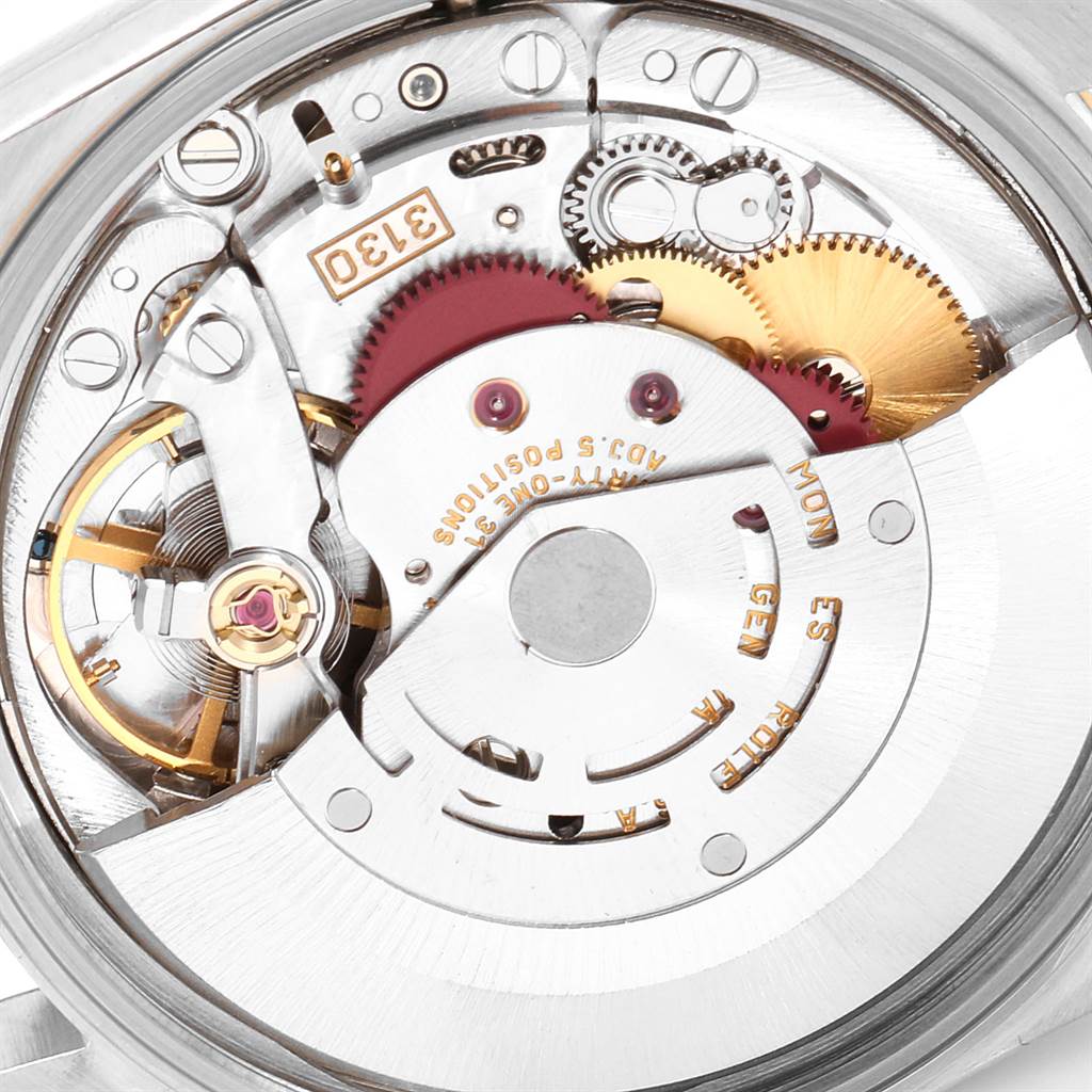 This image shows a close-up view of the movement and internal components of a Rolex Oyster Perpetual 14203 Men's Steel and Gold (two tone) Grey Dial 14203 Men's Steel and Gold (two tone) Grey Dial watch.