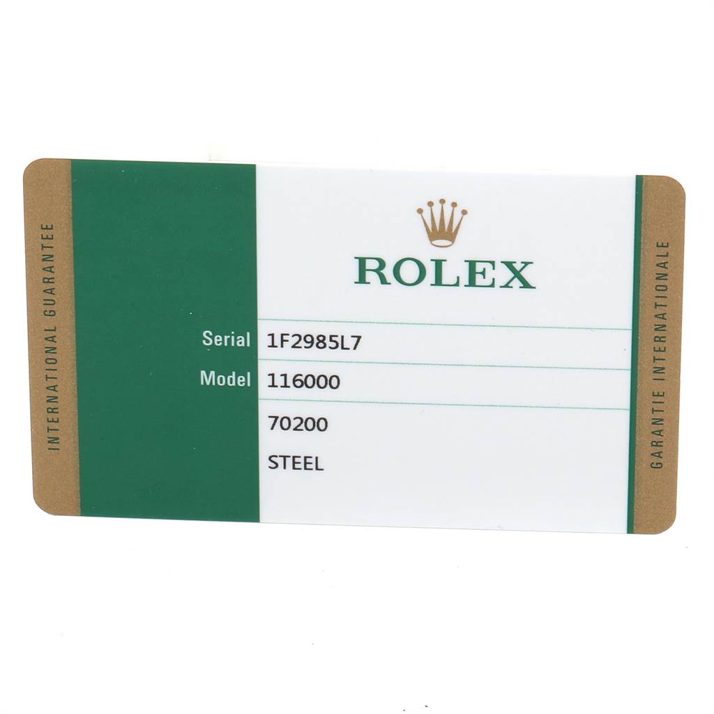 This image shows the international guarantee card for the Rolex Oyster Perpetual 116000 Men's Stainless Steel Grey Dial 116000 Men's Stainless Steel Grey Dial model 116000 with serial number 1F2985L7.