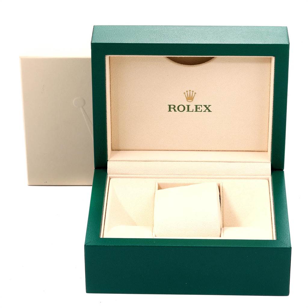 This image shows the open packaging box for a Rolex Oyster Perpetual 114200 Men's Stainless Steel Champagne Dial 114200 Men's Stainless Steel Champagne Dial watch, displaying the interior cushion slot.