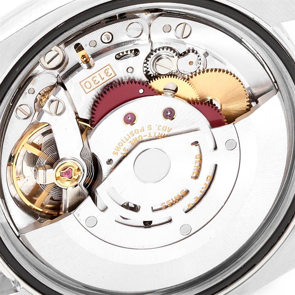 This image shows the movement and internal mechanisms of a Rolex Oyster Perpetual 116000 Men's Stainless Steel Silver Dial 116000 Men's Stainless Steel Silver Dial watch, viewed from the back.