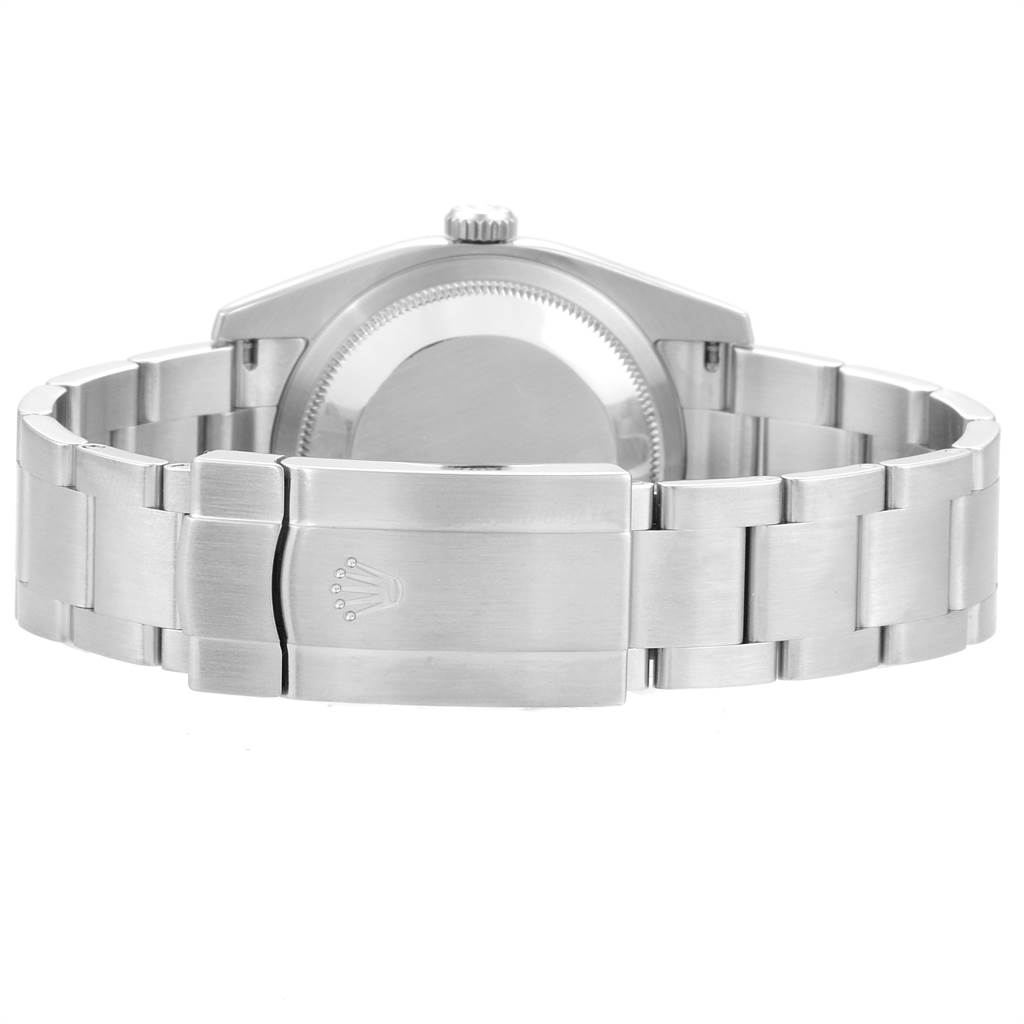 The image shows the back view of a Rolex Oyster Perpetual 116000 Men's Stainless Steel Silver Dial 116000 Men's Stainless Steel Silver Dial watch, focusing on the clasp and metal bracelet.