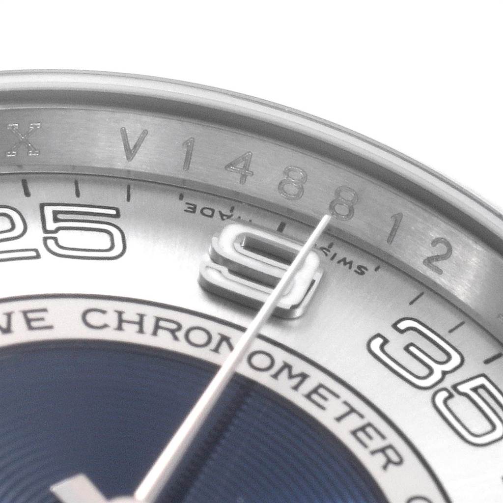The image shows a close-up of the dial, hands, and part of the bezel of a Rolex Oyster Perpetual 116000 Men's Stainless Steel Silver Dial 116000 Men's Stainless Steel Silver Dial watch.