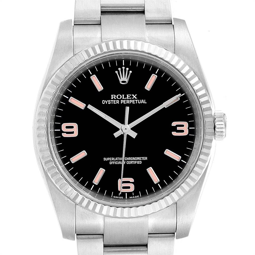 The image shows a front view of the Rolex Oyster Perpetual 116034 Men's Stainless Steel Black Dial 116034 Men's Stainless Steel Black Dial watch, displaying its dial, bezel, and part of the bracelet.