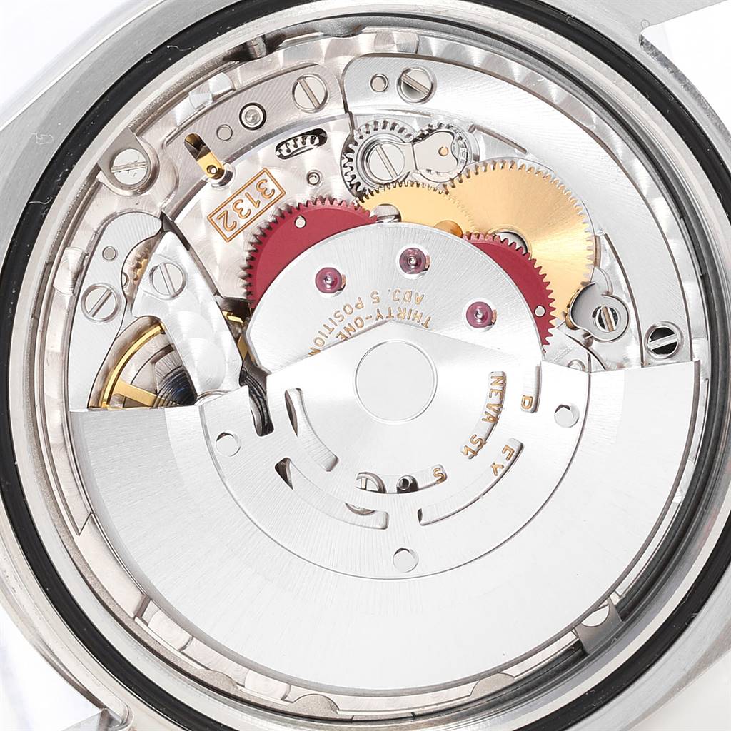 This image shows the internal mechanism of a Rolex Oyster Perpetual 114300 Men's Stainless Steel Blue Dial 114300 Men's Stainless Steel Blue Dial watch from a back angle.