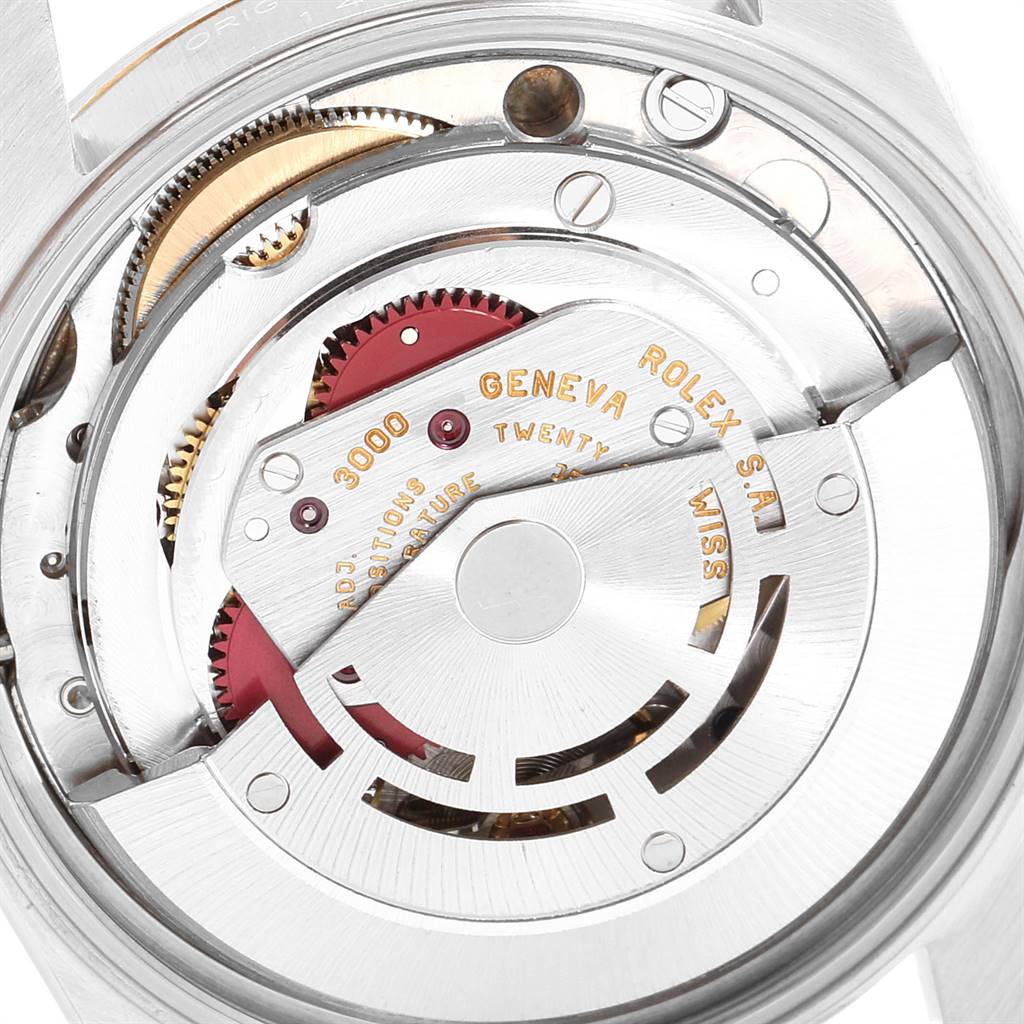 The image shows the movement and internal mechanism parts of a Rolex Oyster Perpetual 14233 Men's Steel and Gold (two tone) Grey Dial 14233 Men's Steel and Gold (two tone) Grey Dial watch from a close-up angle.