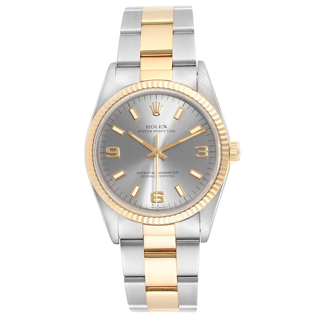The Rolex Oyster Perpetual 14233 Men's Steel and Gold (two tone) Grey Dial 14233 Men's Steel and Gold (two tone) Grey Dial watch is shown from a front angle, displaying its face, bezel, case, and bracelet.
