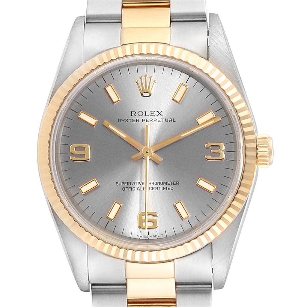 The Rolex Oyster Perpetual 14233 Men's Steel and Gold (two tone) Grey Dial 14233 Men's Steel and Gold (two tone) Grey Dial watch is shown from a front view, displaying its dial, bezel, and part of the bracelet.