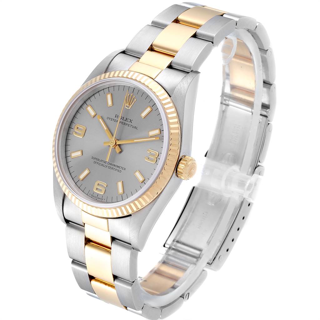 The image shows a Rolex Oyster Perpetual 14233 Men's Steel and Gold (two tone) Grey Dial 14233 Men's Steel and Gold (two tone) Grey Dial watch at an angle highlighting its dial, case, bezel, and bracelet.