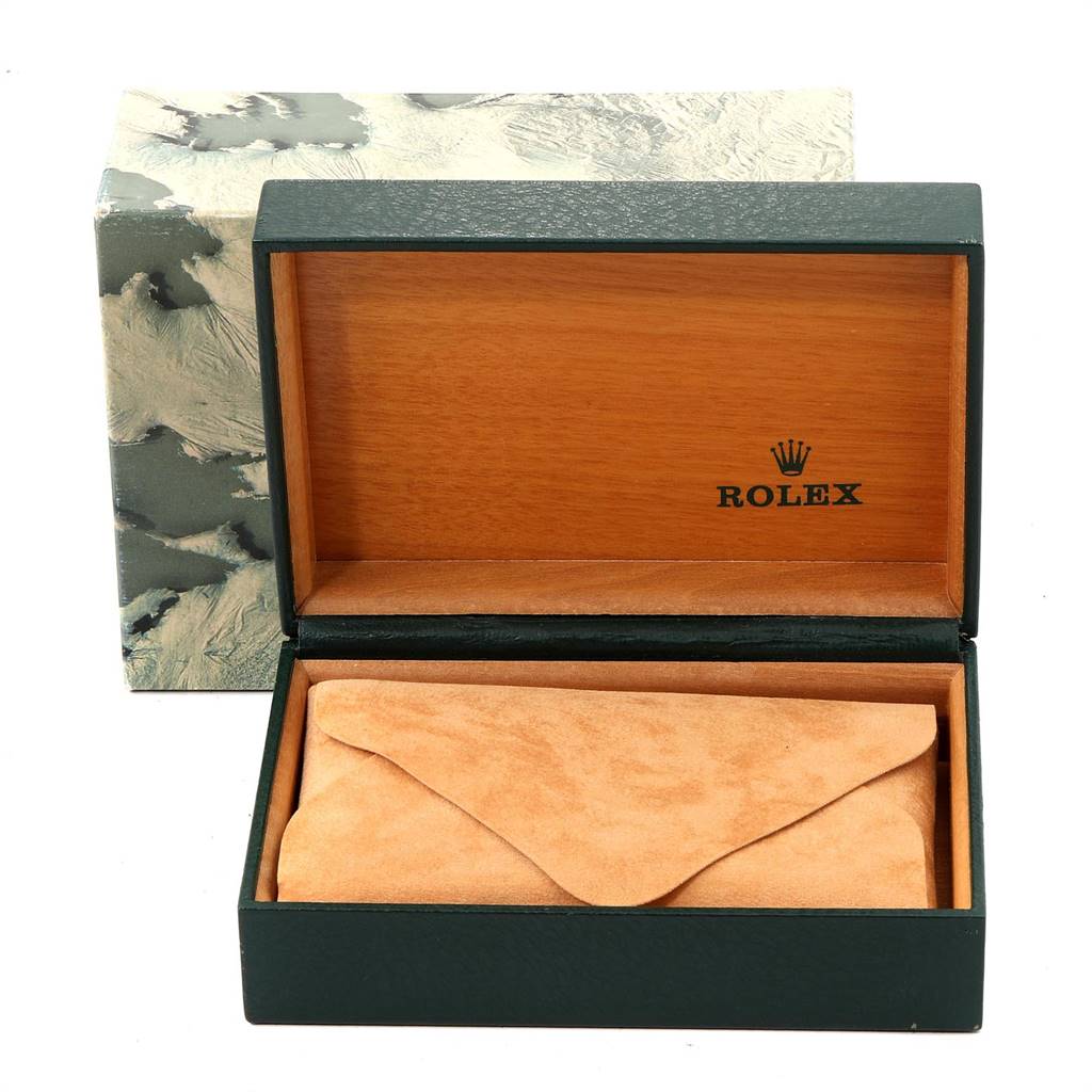 The image shows an open Rolex Oyster Perpetual 14233 Men's Steel and Gold (two tone) Grey Dial 14233 Men's Steel and Gold (two tone) Grey Dial watch box, featuring a suede pouch inside and the brand logo on the inner lid.