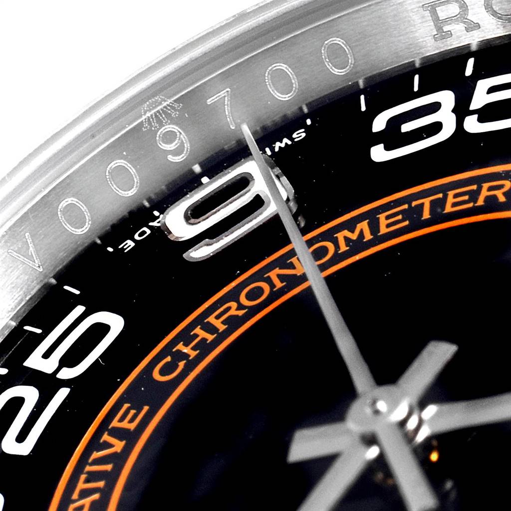 The image shows a close-up of the dial and bezel of a Rolex Oyster Perpetual 116034 Men's Stainless Steel Black Dial 116034 Men's Stainless Steel Black Dial watch, highlighting the numerals and words "Chronometer."