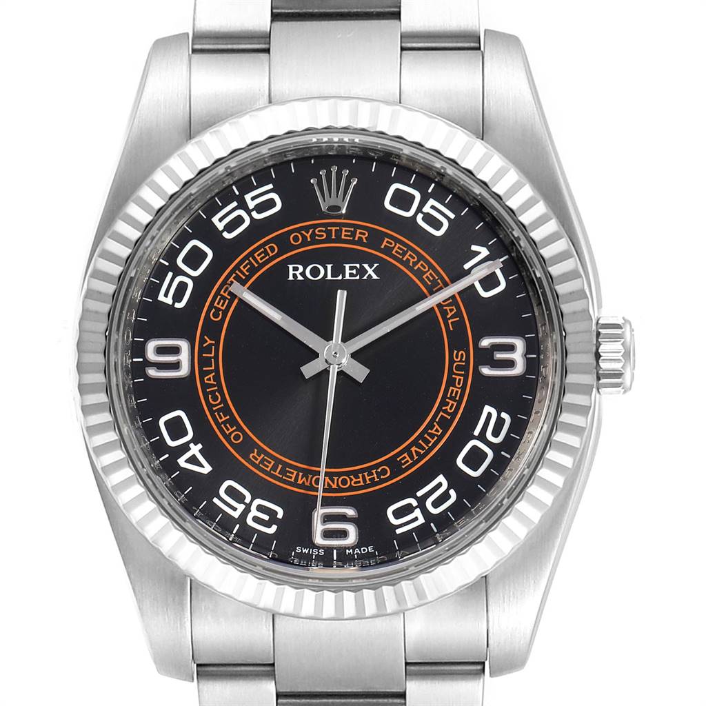 The image shows a front view of the face and part of the bracelet of a Rolex Oyster Perpetual 116034 Men's Stainless Steel Black Dial 116034 Men's Stainless Steel Black Dial watch.