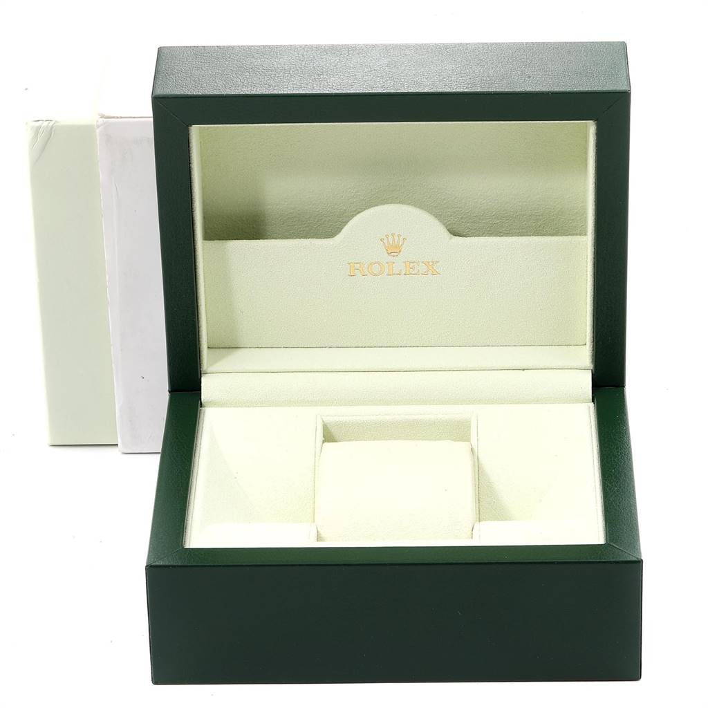 The image shows an open Rolex Oyster Perpetual 116034 Men's Stainless Steel Black Dial 116034 Men's Stainless Steel Black Dial watch box at a front angle, displaying its green exterior and cream interior.