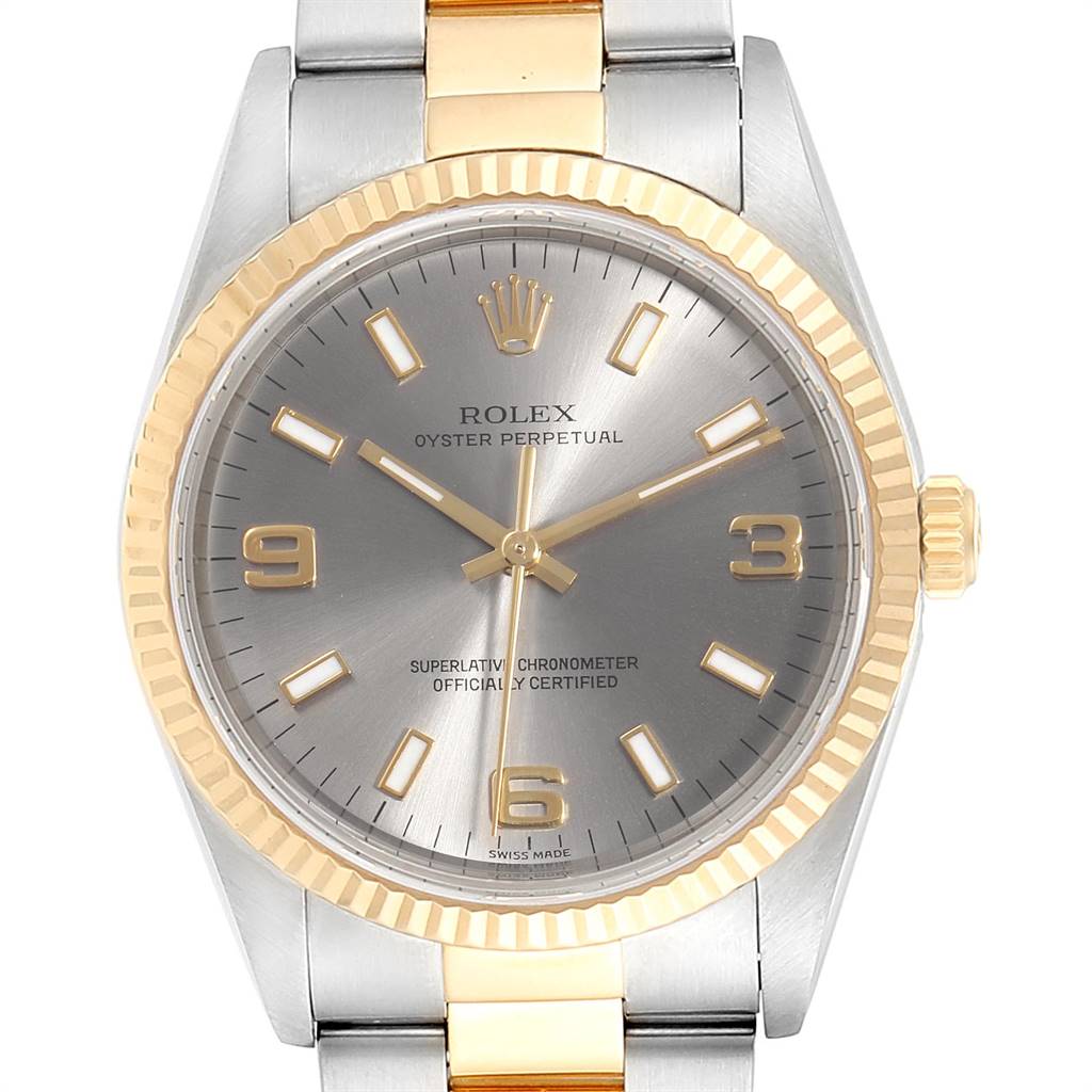 The image shows a front view of a Rolex Oyster Perpetual 14233 Men's Steel and Gold (two tone) Grey Dial 14233 Men's Steel and Gold (two tone) Grey Dial watch, highlighting the dial, bezel, and part of the bracelet.