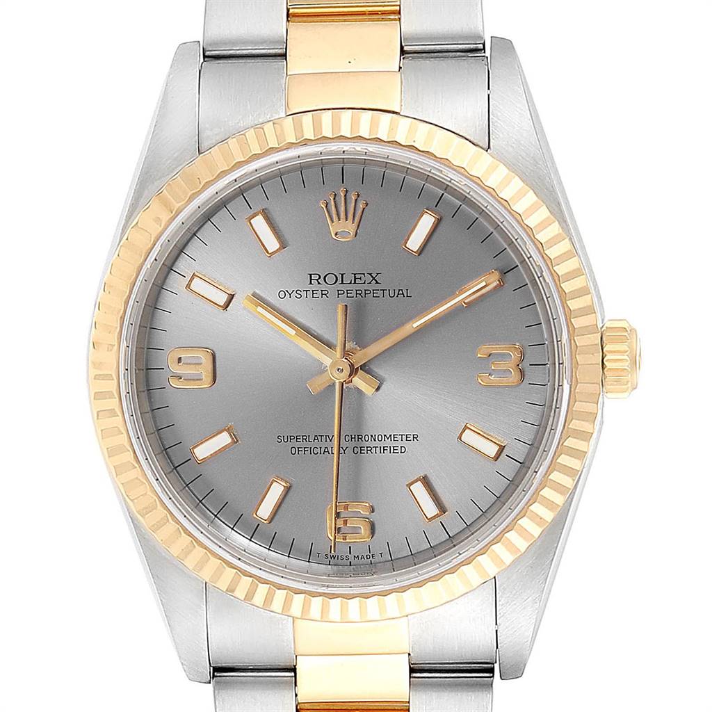 The image shows a front view of a Rolex Oyster Perpetual 14233 Men's Steel and Gold (two tone) Grey Dial 14233 Men's Steel and Gold (two tone) Grey Dial watch, highlighting the dial, hands, bezel, and part of the bracelet.