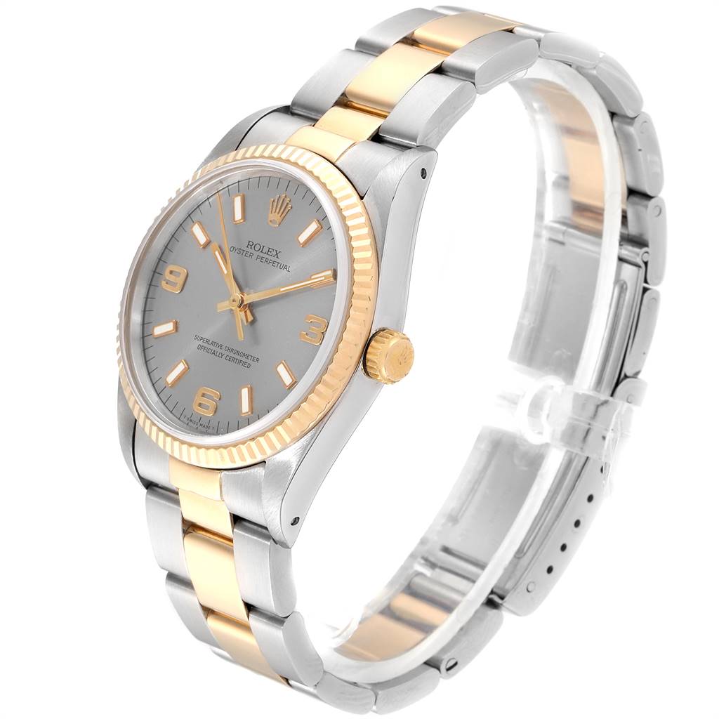 The Rolex Oyster Perpetual 14233 Men's Steel and Gold (two tone) Grey Dial 14233 Men's Steel and Gold (two tone) Grey Dial watch is shown at a three-quarter angle, displaying the face, bezel, crown, and bracelet.