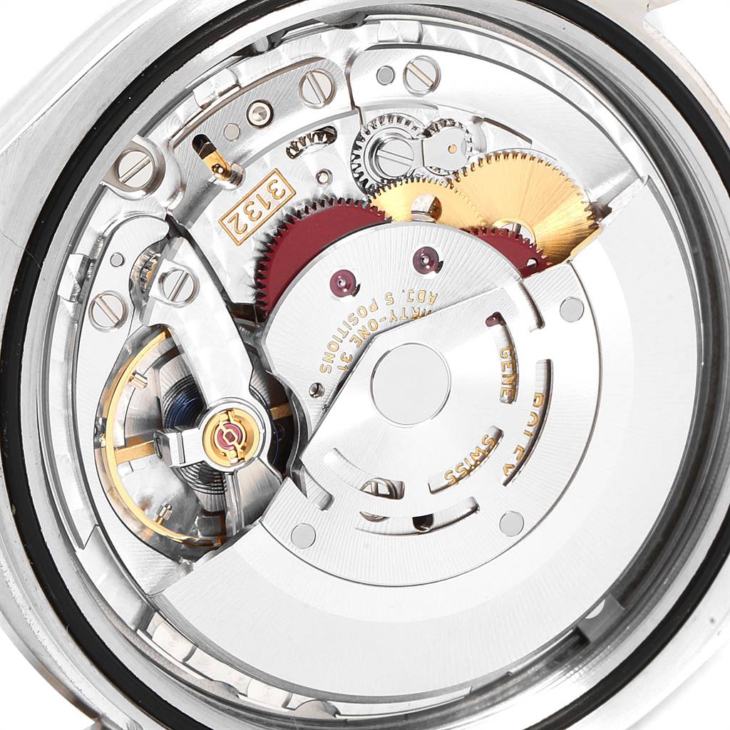 This image shows the internal mechanics of a Rolex Oyster Perpetual 114300 Men's Stainless Steel Silver Dial 114300 Men's Stainless Steel Silver Dial watch, focusing on the movement and gears.