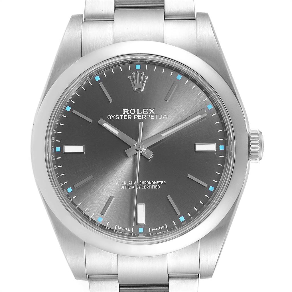 The image shows a frontal view of a Rolex Oyster Perpetual 114300 Men's Stainless Steel Silver Dial 114300 Men's Stainless Steel Silver Dial watch with a metal bracelet and dark dial.