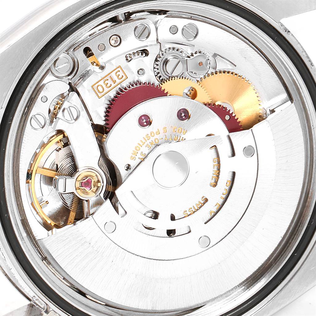 The image shows the internal mechanical movement of a Rolex Oyster Perpetual 116034 Men
s Stainless Steel Black Dial 116034 Men
s Stainless Steel Black Dial watch.