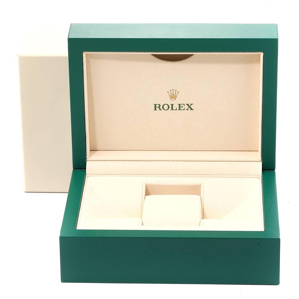 This is an open Rolex watch box, specifically for the Oyster Perpetual model, showing its interior compartments.
