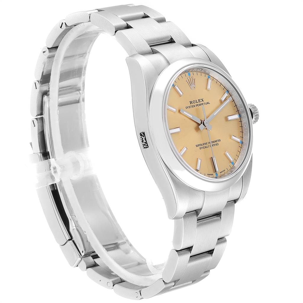 The image shows a Rolex Oyster Perpetual 114200 Men
s Stainless Steel Champagne Dial 114200 Men
s Stainless Steel Champagne Dial watch at a three-quarter angle, highlighting its bracelet, case, and dial.