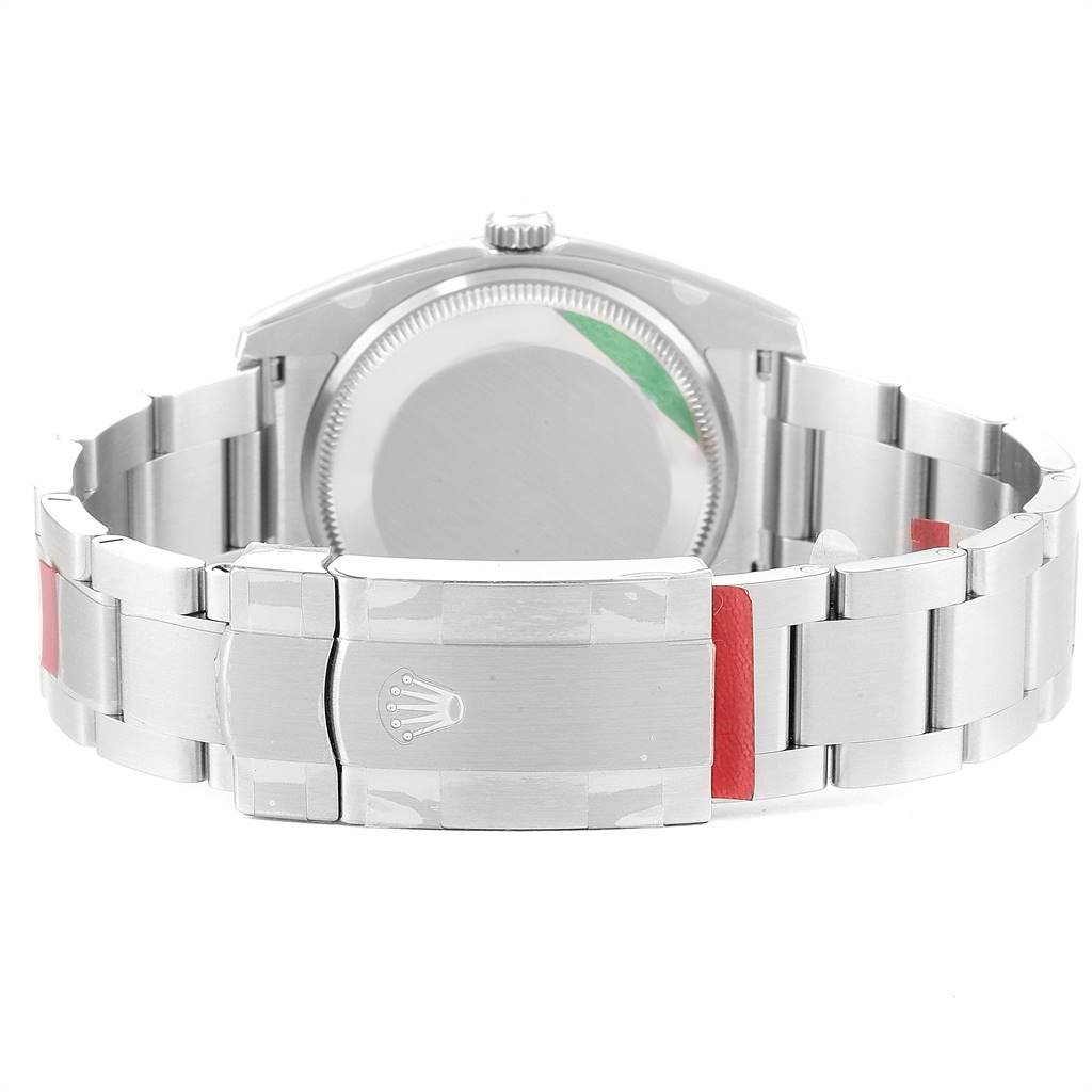 This image shows the backside of the Rolex Oyster Perpetual 114200 Men
s Stainless Steel Champagne Dial 114200 Men
s Stainless Steel Champagne Dial watch, highlighting the bracelet and clasp.