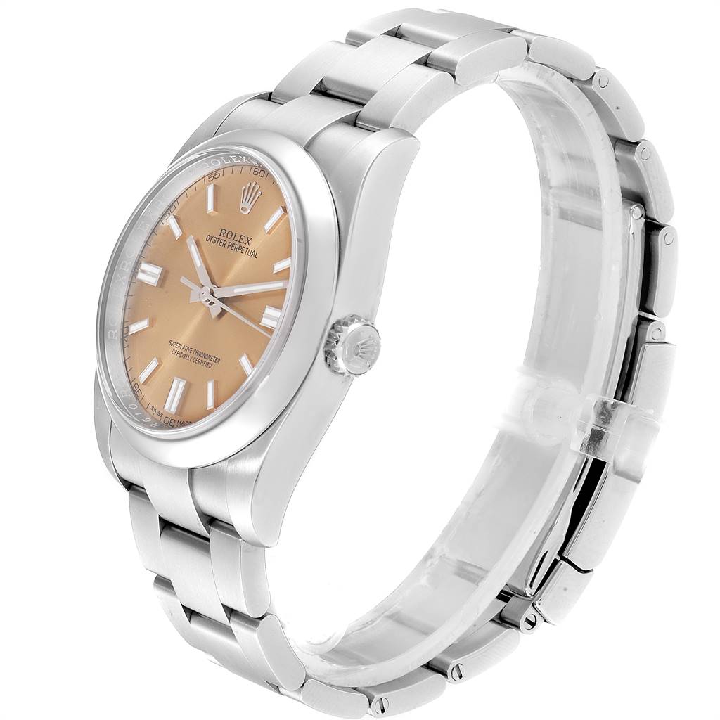 This image shows a side angle of the Rolex Oyster Perpetual 116000 Men's Stainless Steel Champagne Dial 116000 Men's Stainless Steel Champagne Dial watch, capturing the dial, bracelet, and crown.