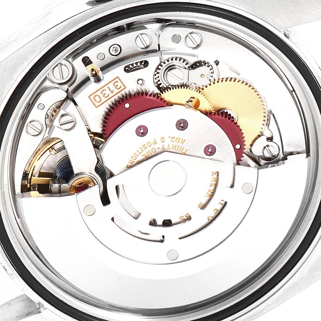 This image shows a close-up view of the internal mechanism of a Rolex Oyster Perpetual 116000 Men's Stainless Steel Grey Dial 116000 Men's Stainless Steel Grey Dial watch.